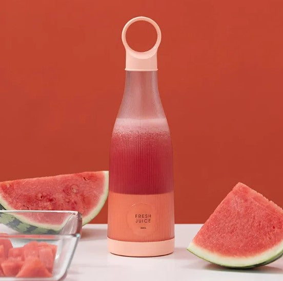 Auraz™  Mini Hand-held Juice Extractor