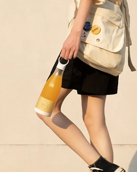 Auraz™  Mini Hand-held Juice Extractor